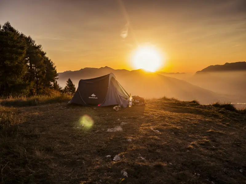Tent at sunset on a ridge